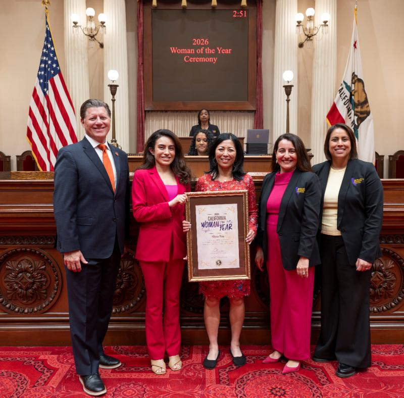  Senator Sasha Renee Perez and Joy Chen, the Executive Director of Eaton Fire Survivors Network, stand beside other California lawmakers for a photo to commemorate Chen being recognized as Senate District 25's Woman of the Year during a ceremony on the Senate floor. 